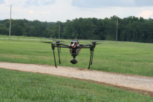 AERPAW drone taking off in a field
