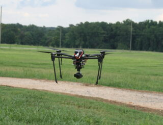AERPAW drone taking off in a field
